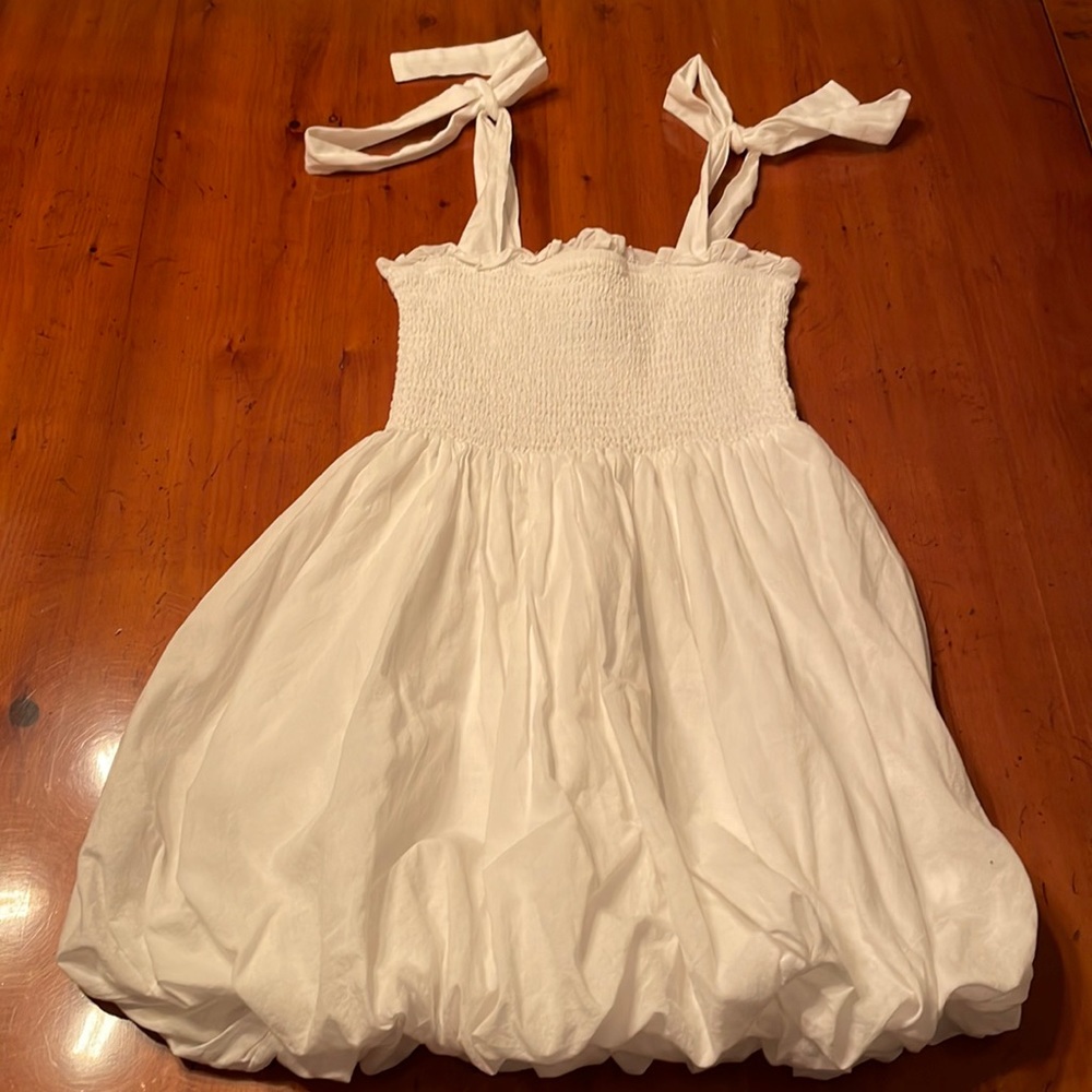 Katie J white adjustable strap sundress with balloon bottom
